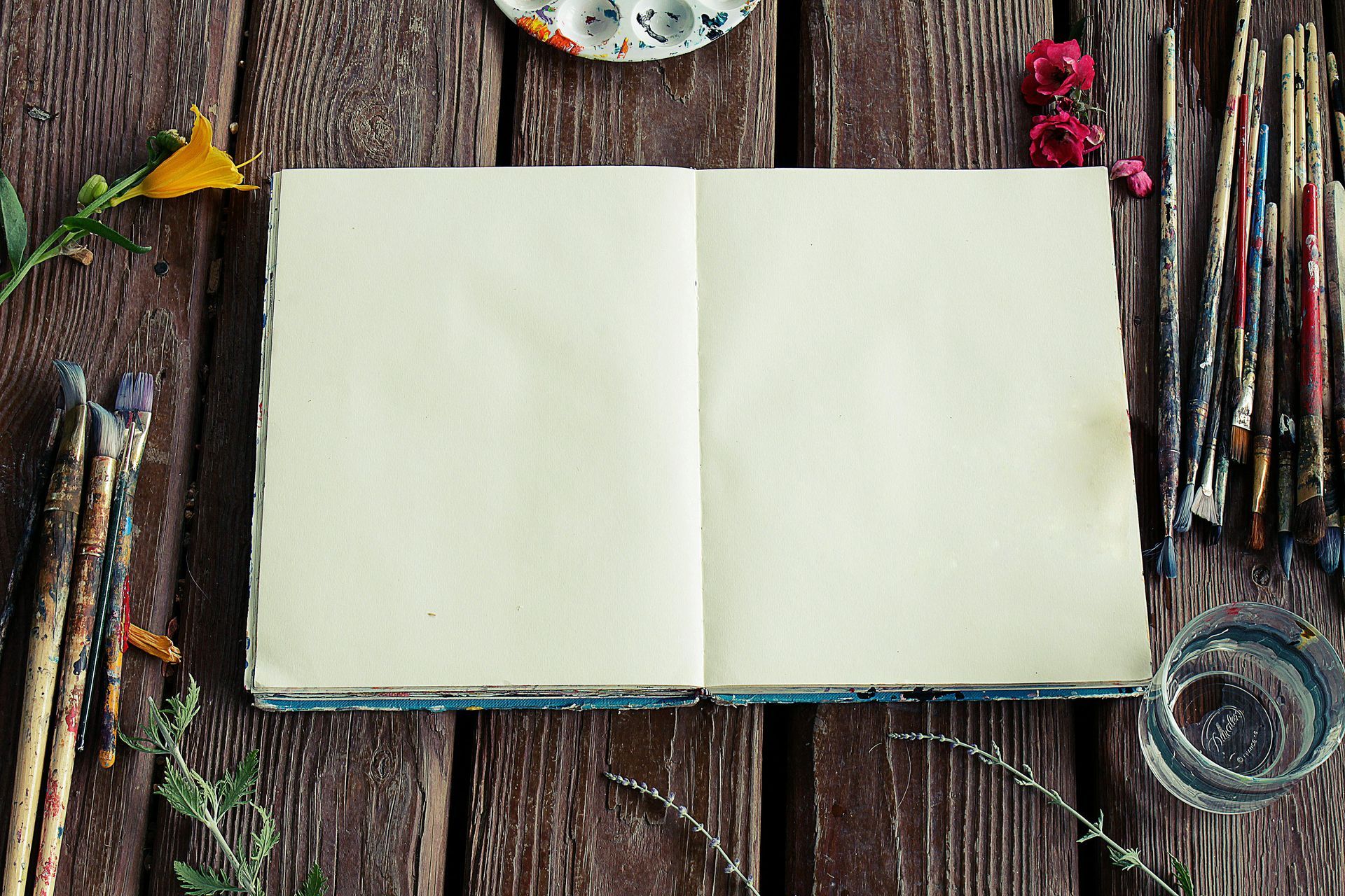 energy healer. Image of a journal with art supplies. 