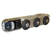 Robotic crawler with camera and lights, designed for inspecting pipes.