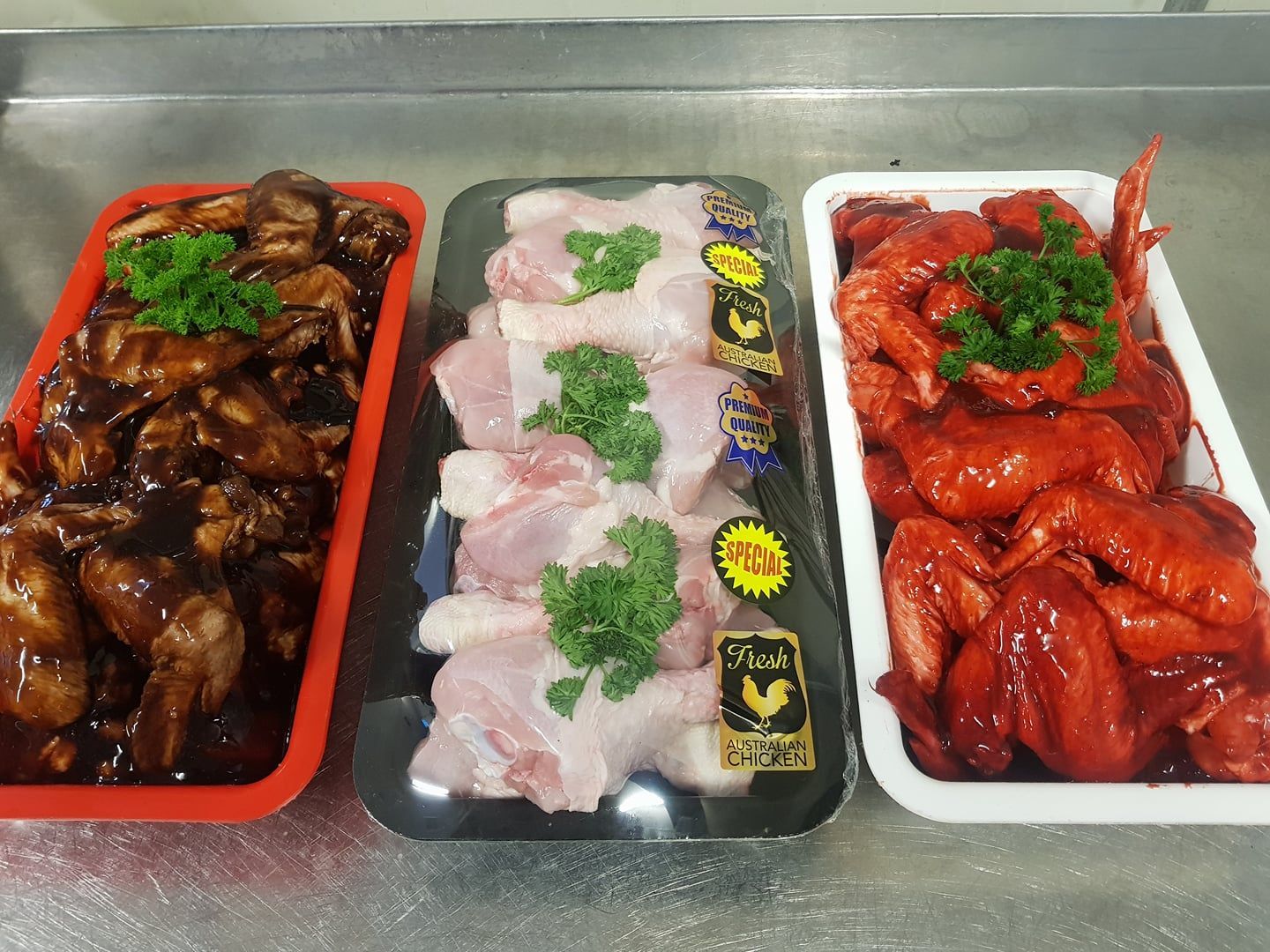 Three Trays of Chicken: Glazed Wings, Raw Chicken Pieces, and Red-sauced Wings — Paddock to Plate in Tamworth, NSW