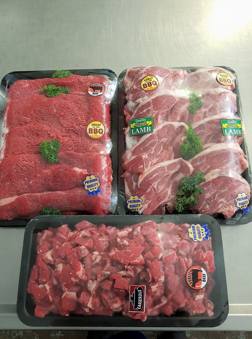 Three Trays of Raw Meat, Including Sliced Steak, Pork Steaks, and Diced Beef, Packaged — Paddock to Plate in Tamworth, NSW