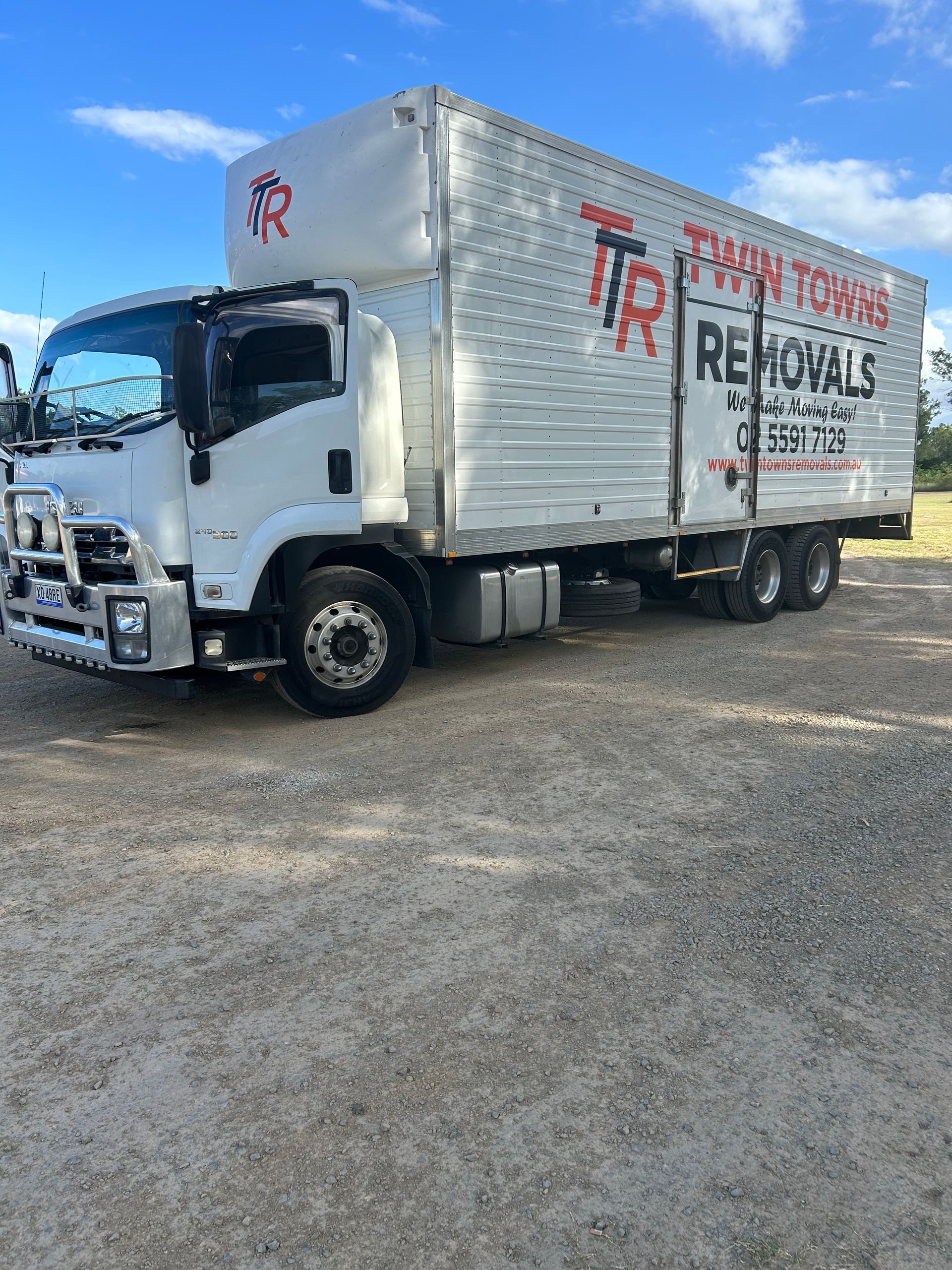 white removal truck parked next to gravel -  Twin Towns Removals Mid North Coast In Forster, NSW