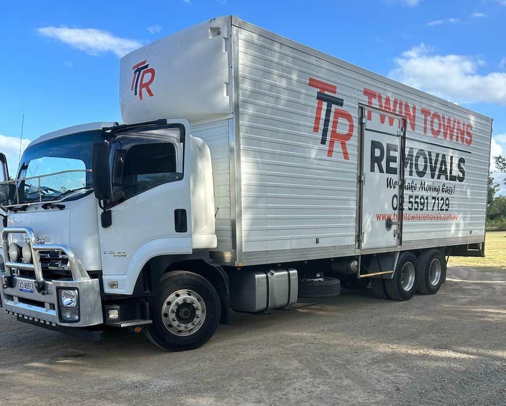 white removal truck parked on gravel - Twin Towns Removals Mid North Coast In Forster, NSW