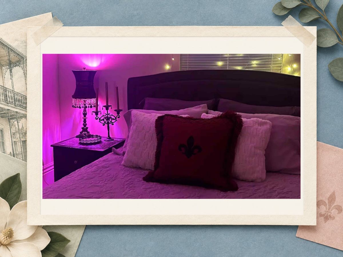 Purple guest bedroom at The New Marigny House vacation rental in St. Roch, New Orleans, in a scrapbook frame