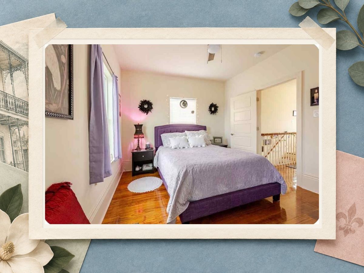 Angled view of the purple guest bedroom at The New Marigny House vacation rental in New Orleans