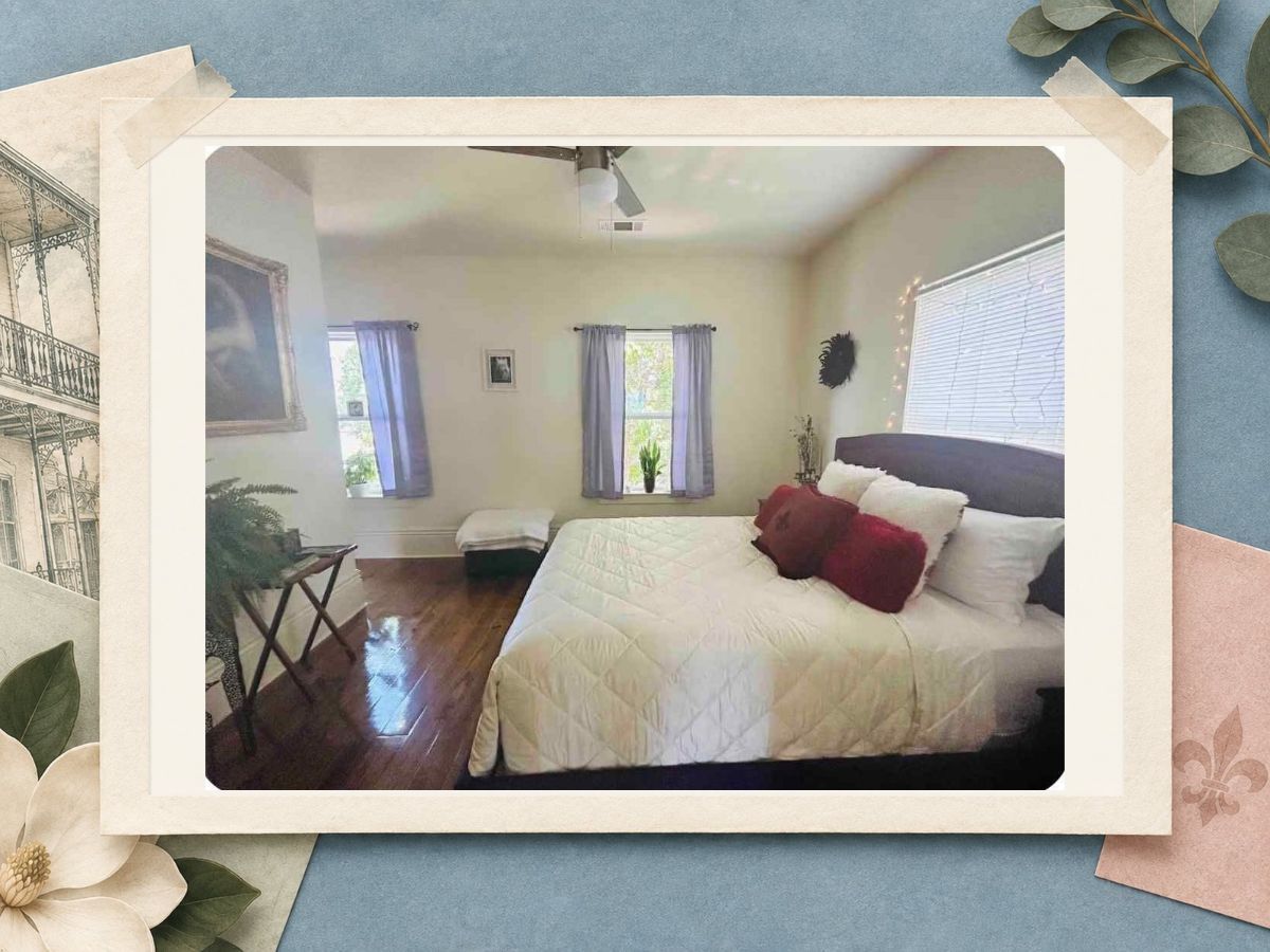 Wide view of the purple guest bedroom at The New Marigny House vacation rental in New Orleans