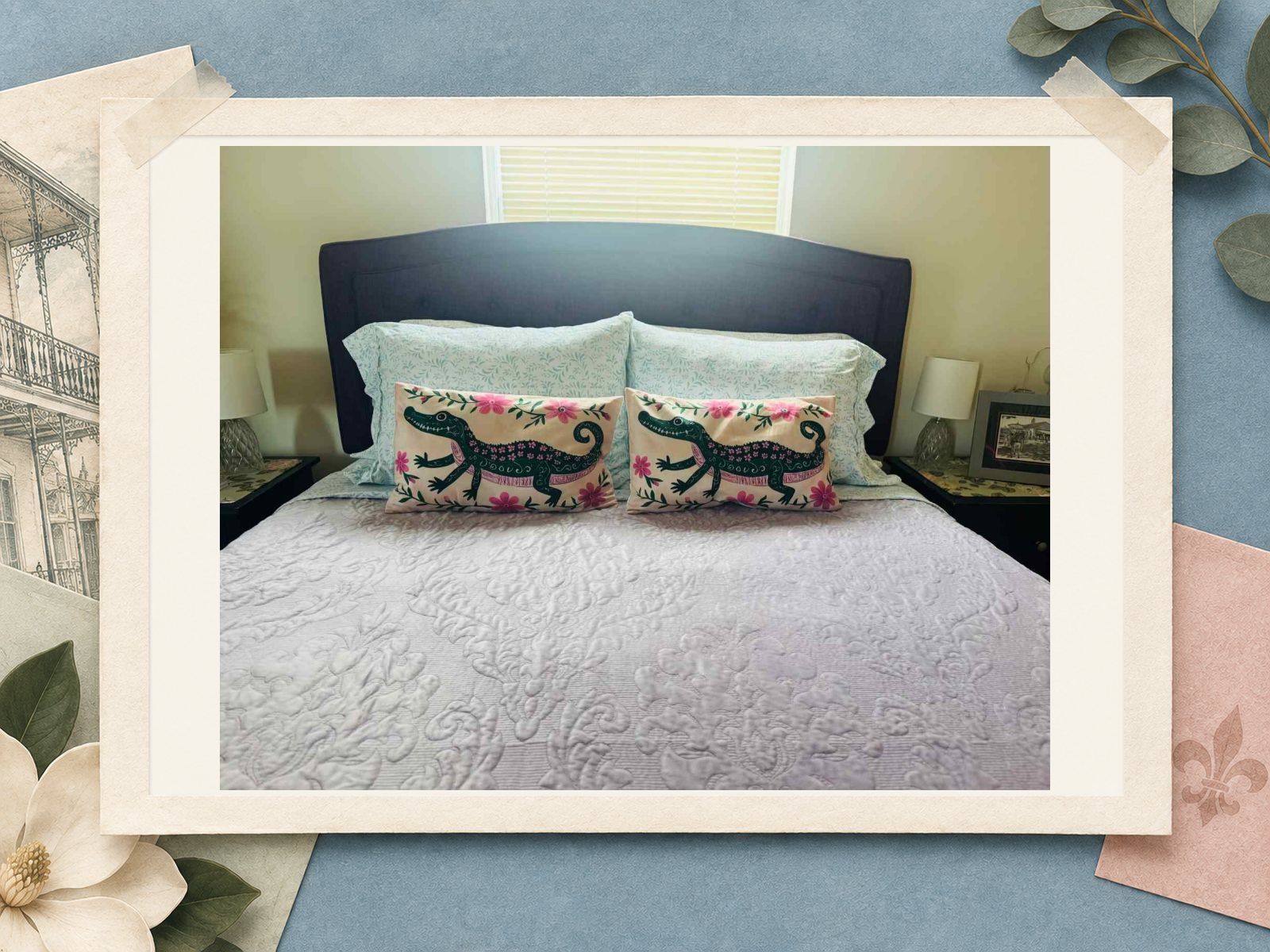 Crocodile accent pillows on a guest bed at The New Marigny House vacation rental in New Orleans