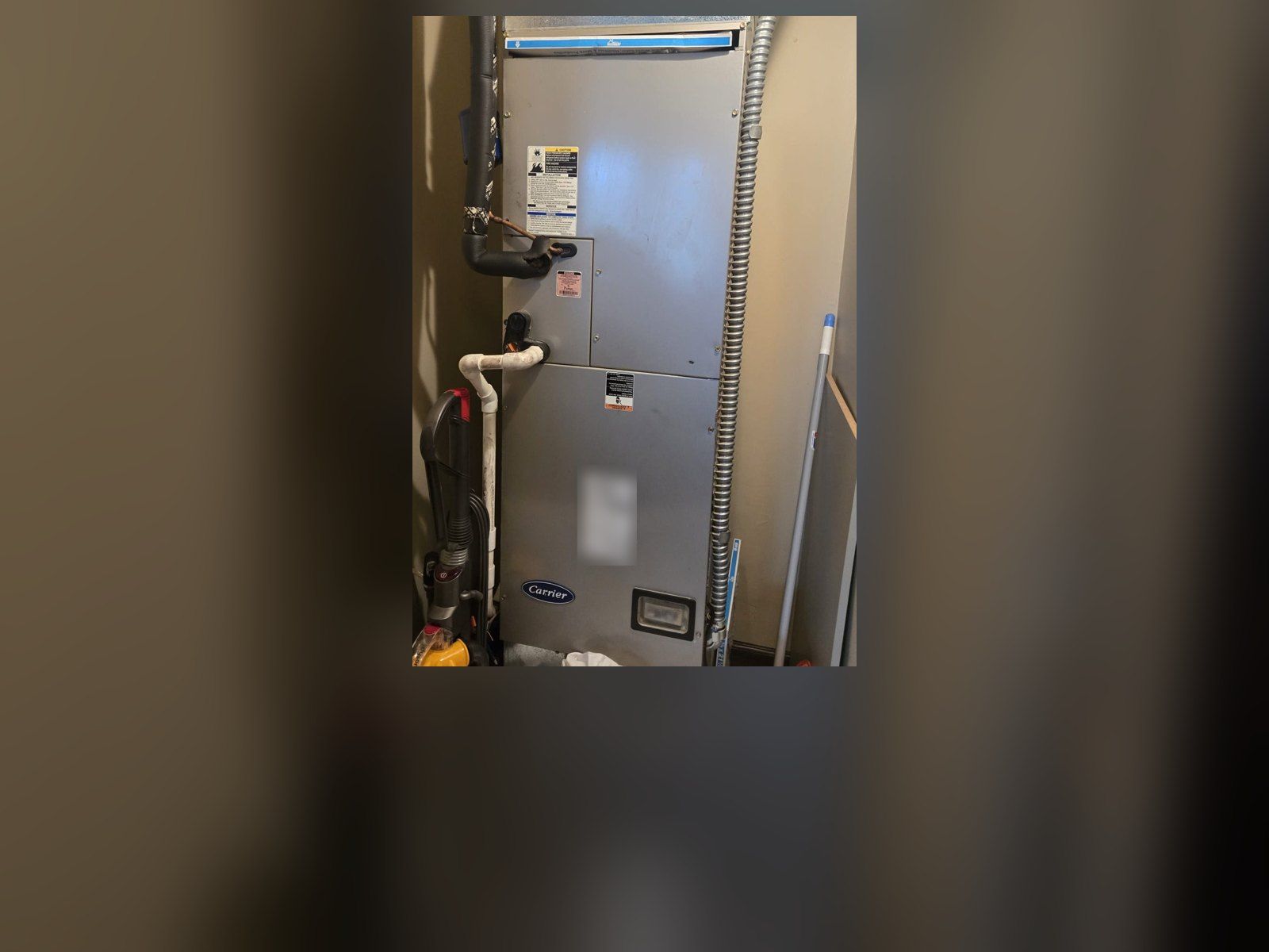 Carrier indoor air handler in a closet in an East Wenatchee home after an Alpine Aire repair visit