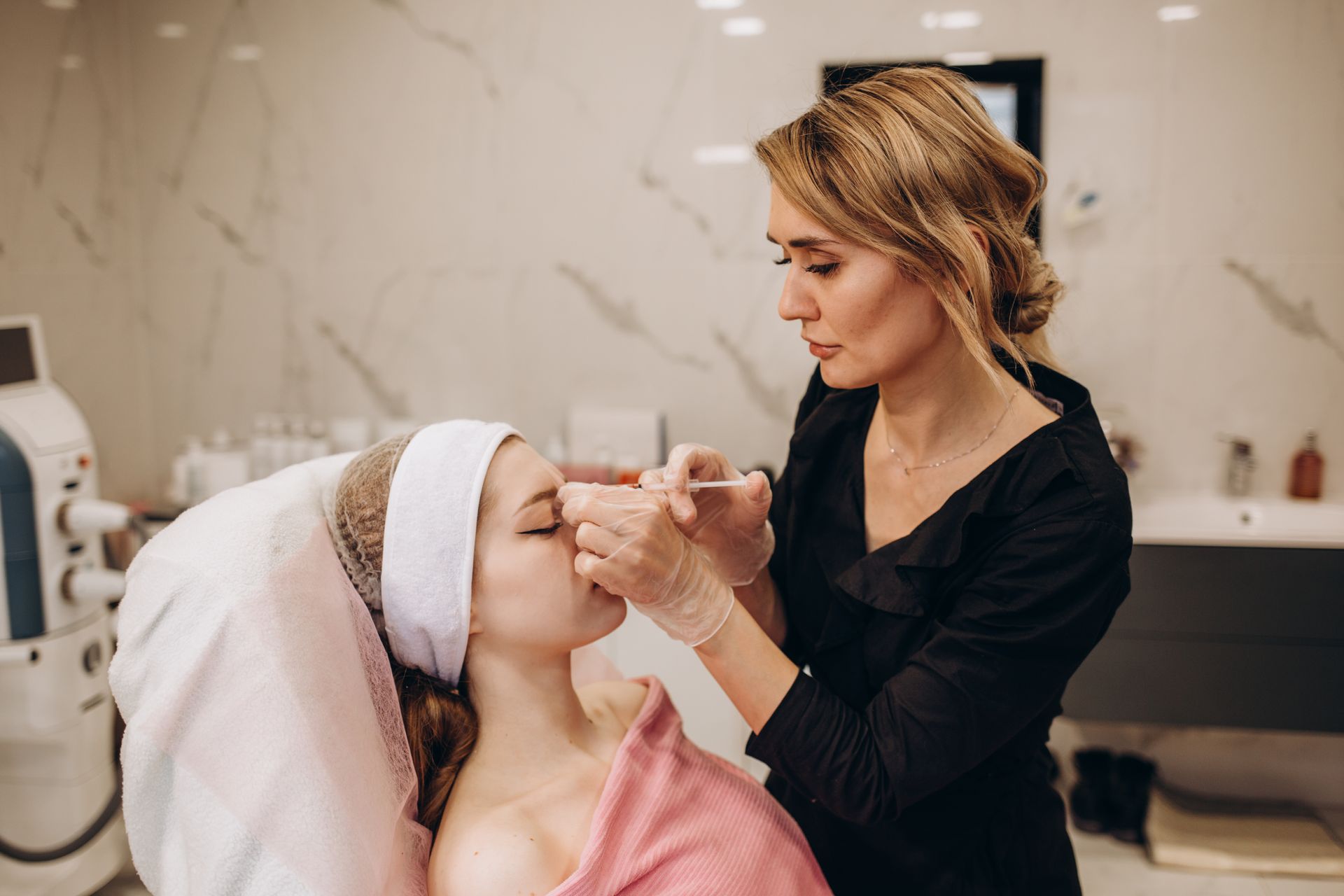 Woman receiving injection treatments