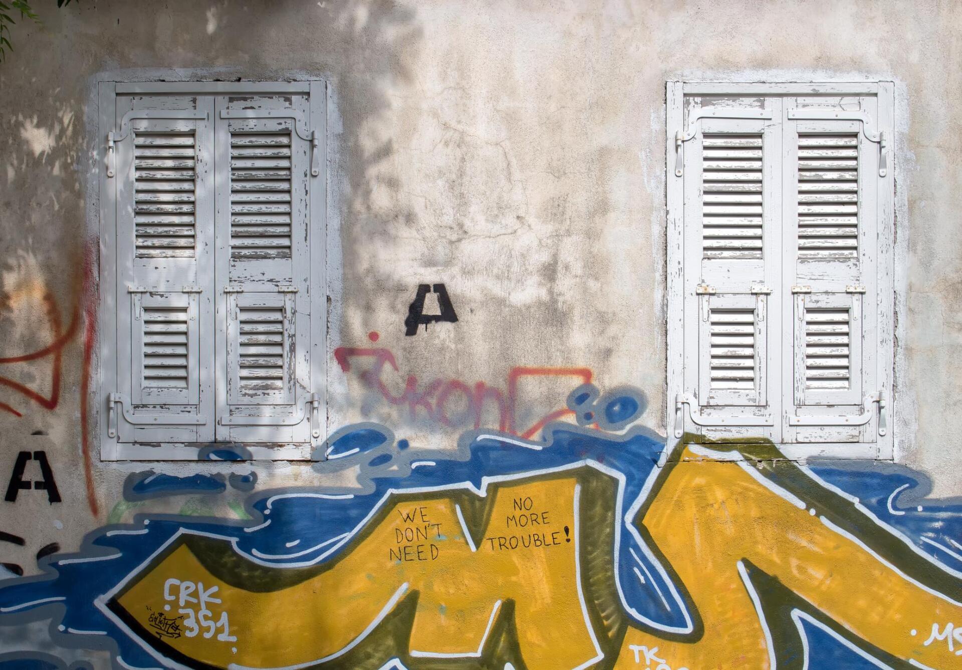 Graffiti on house that needs cleaning