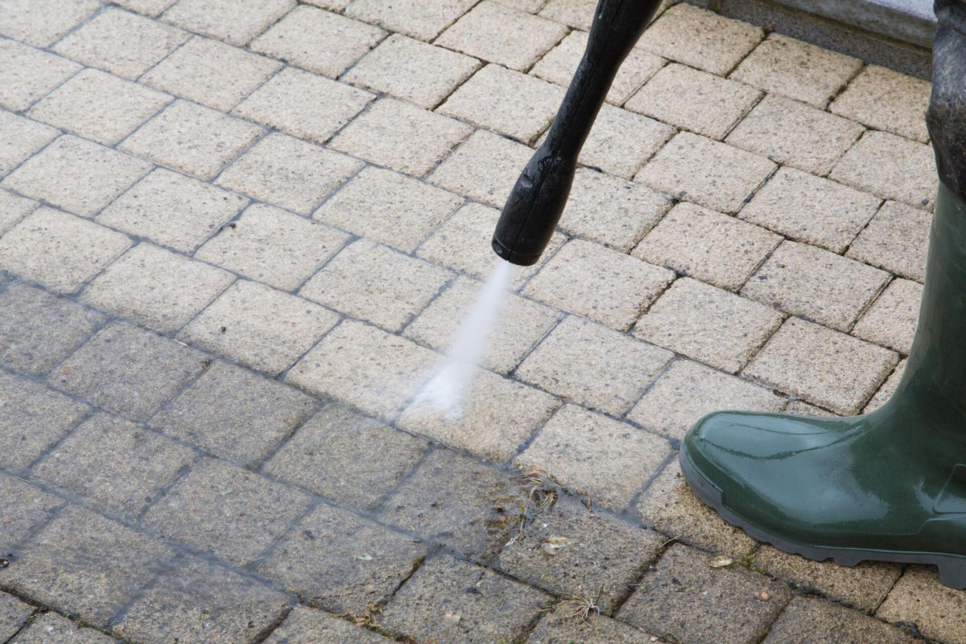 Pressure washing a patio