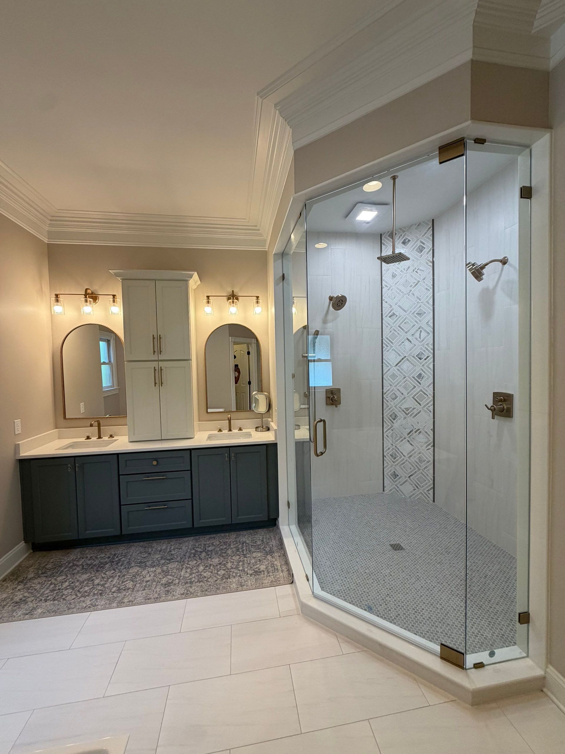 Franklin TN bathroom remodel with custom glass walk-in shower and two-tone cabinetry