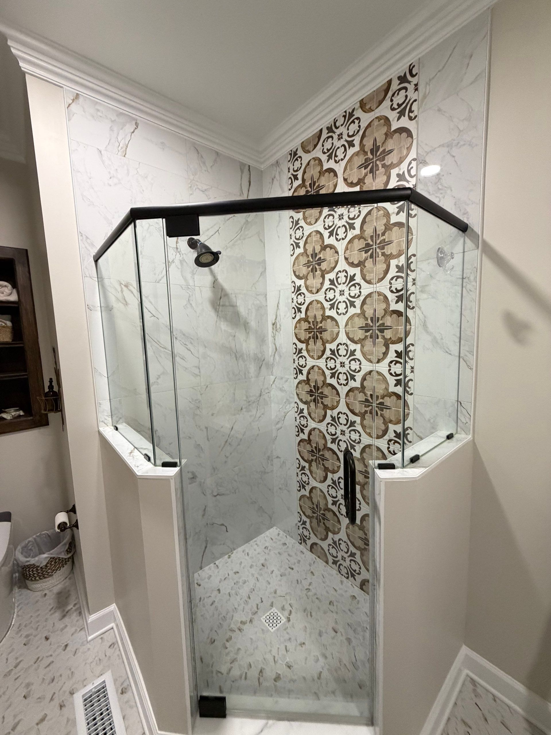Brentwood, Tennessee bathroom remodel features a glass shower enclosure and accent tile