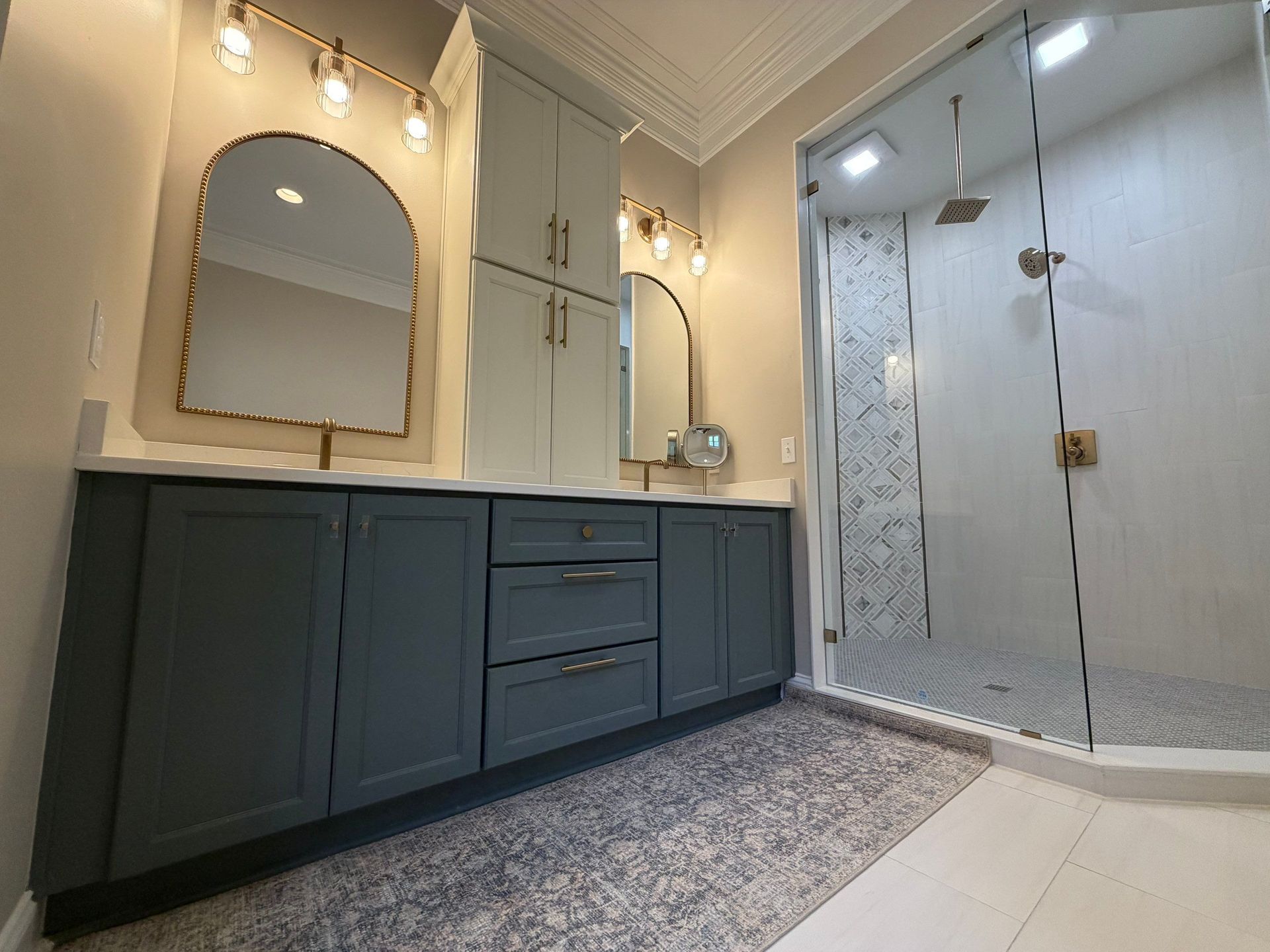 Custom bathroom in Franklin TN featuring a glass shower and custom-built vanity