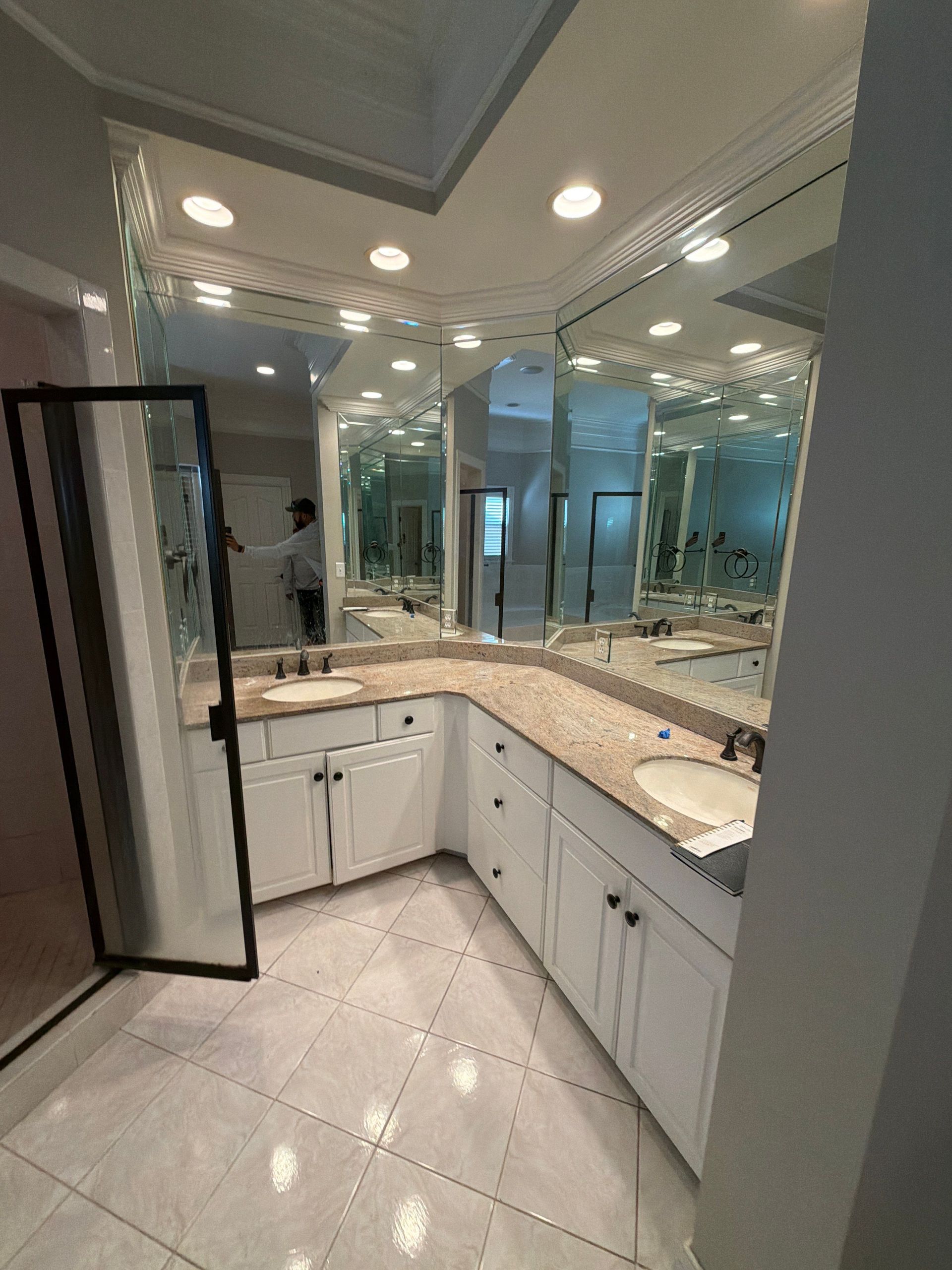Double vanity and lighting installation in this Franklin, Tennessee bathroom remodel