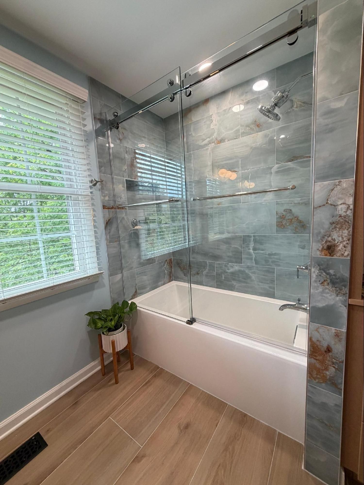 Nashville bathroom renovation with glass sliding doors