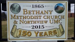 A sign celebrating 150 years of Bethany Methodist Church & Northview UMC, 1865-2015, featuring two historical photos.