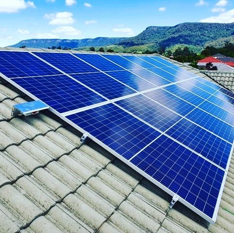A Roof With a Lot of Solar Panels on It — Solarblu Pty Ltd in Kangaroo Valley, NSW