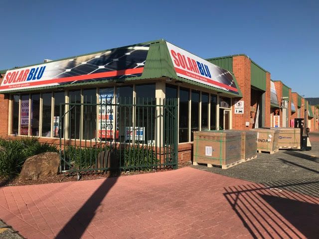A Building With a Sign That Says Solarblu on It — Solarblu Pty Ltd in Kangaroo Valley, NSW