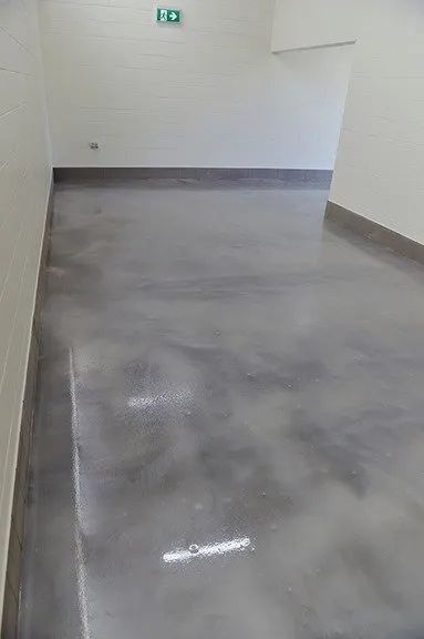 A Room With a Shiny Concrete Floor and White Walls  — NHM Painting & Projects in Ciccone, NT