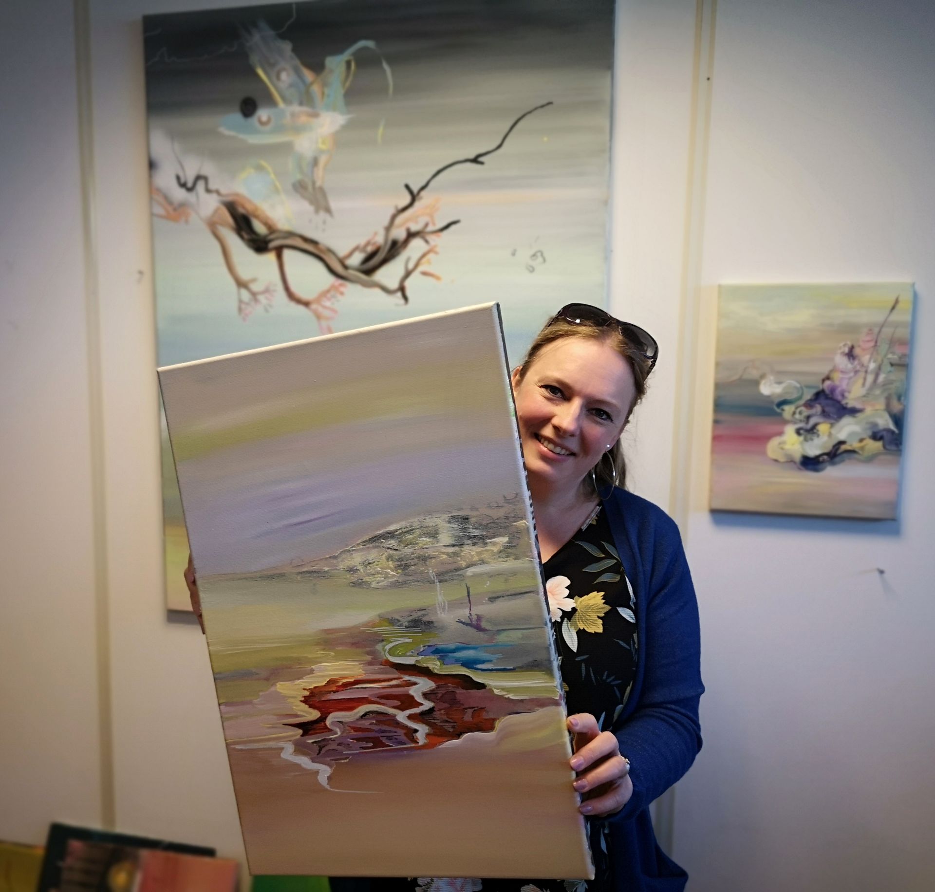 happy client holding artowork