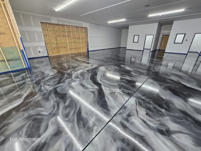 Metallic epoxy garage floor with silver and black marble swirl.