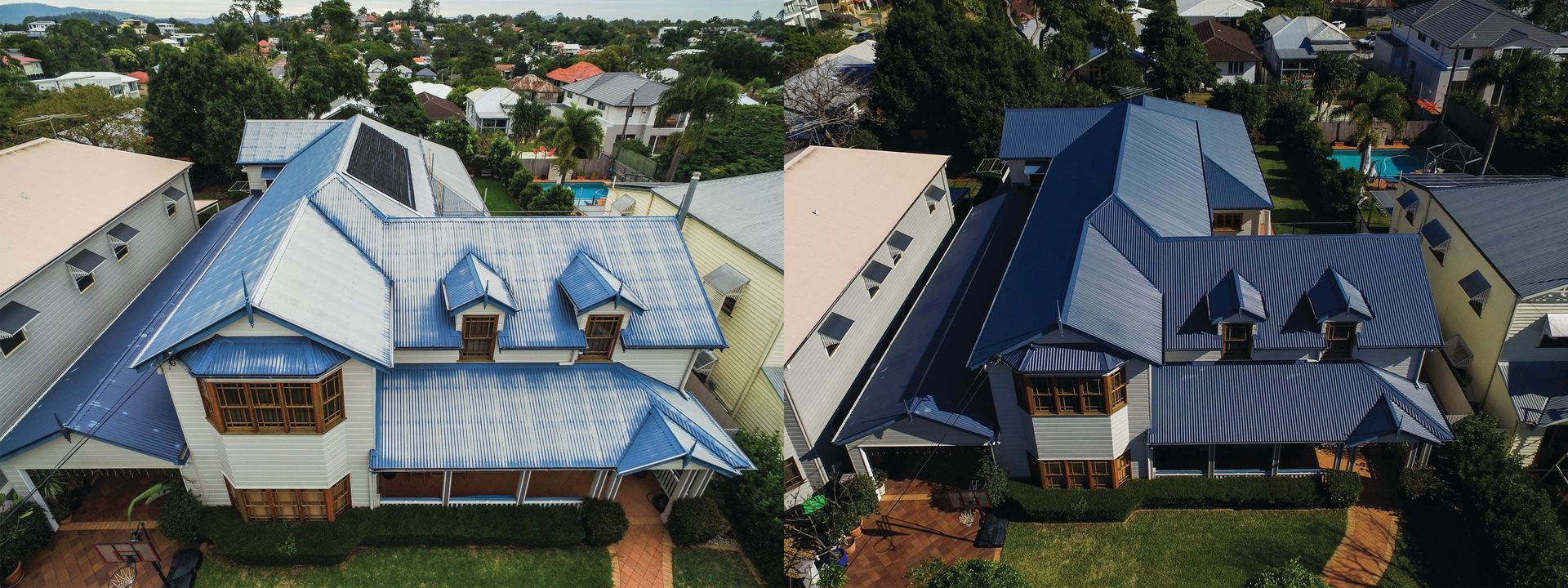 Two neighboring houses with blue roofs in a leafy residential neighborhood