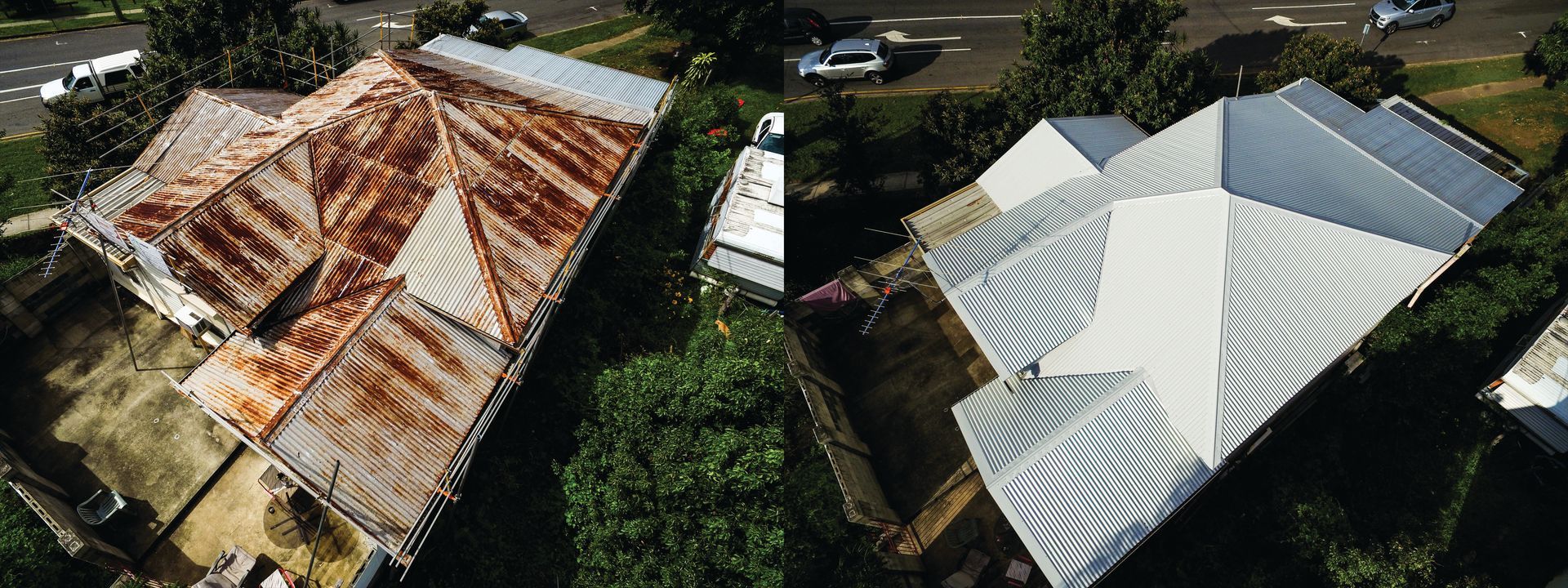 Aerial view of two adjacent houses, one with a rusted roof and one with a white roof, surrounded by greenery.