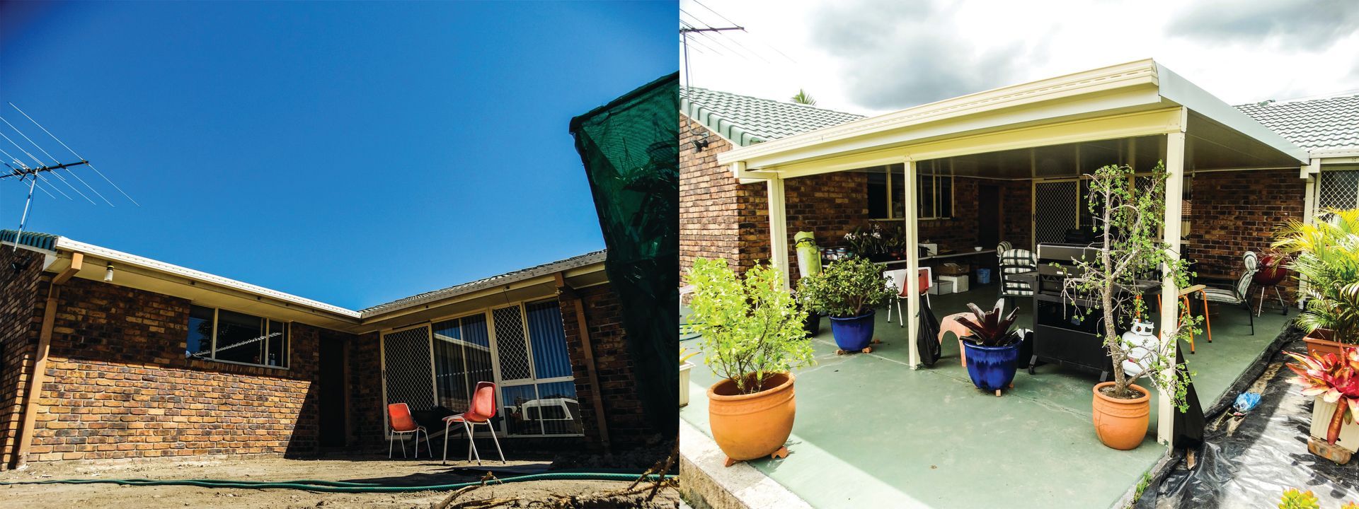 Sunlit backyard patio with potted plants, white porch, and brick outbuildings under a blue sky