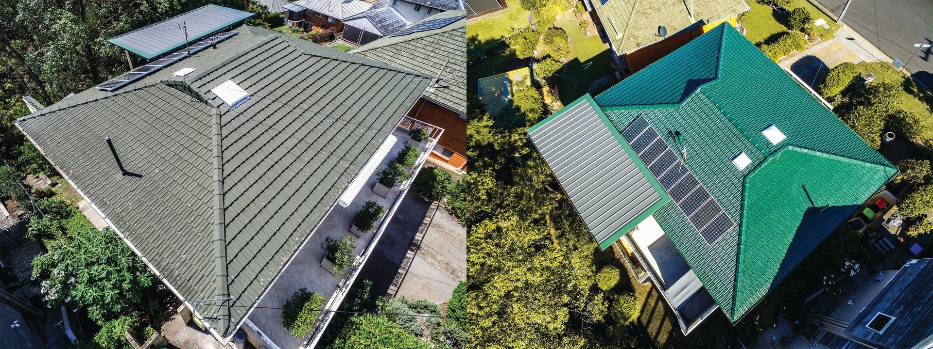 Aerial view of two houses with gray and green roofs surrounded by trees and a driveway