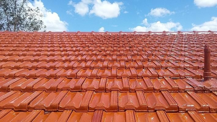 Restored roof | Featured image for the Improving Curb Appeal Blog by MHI Roofing.