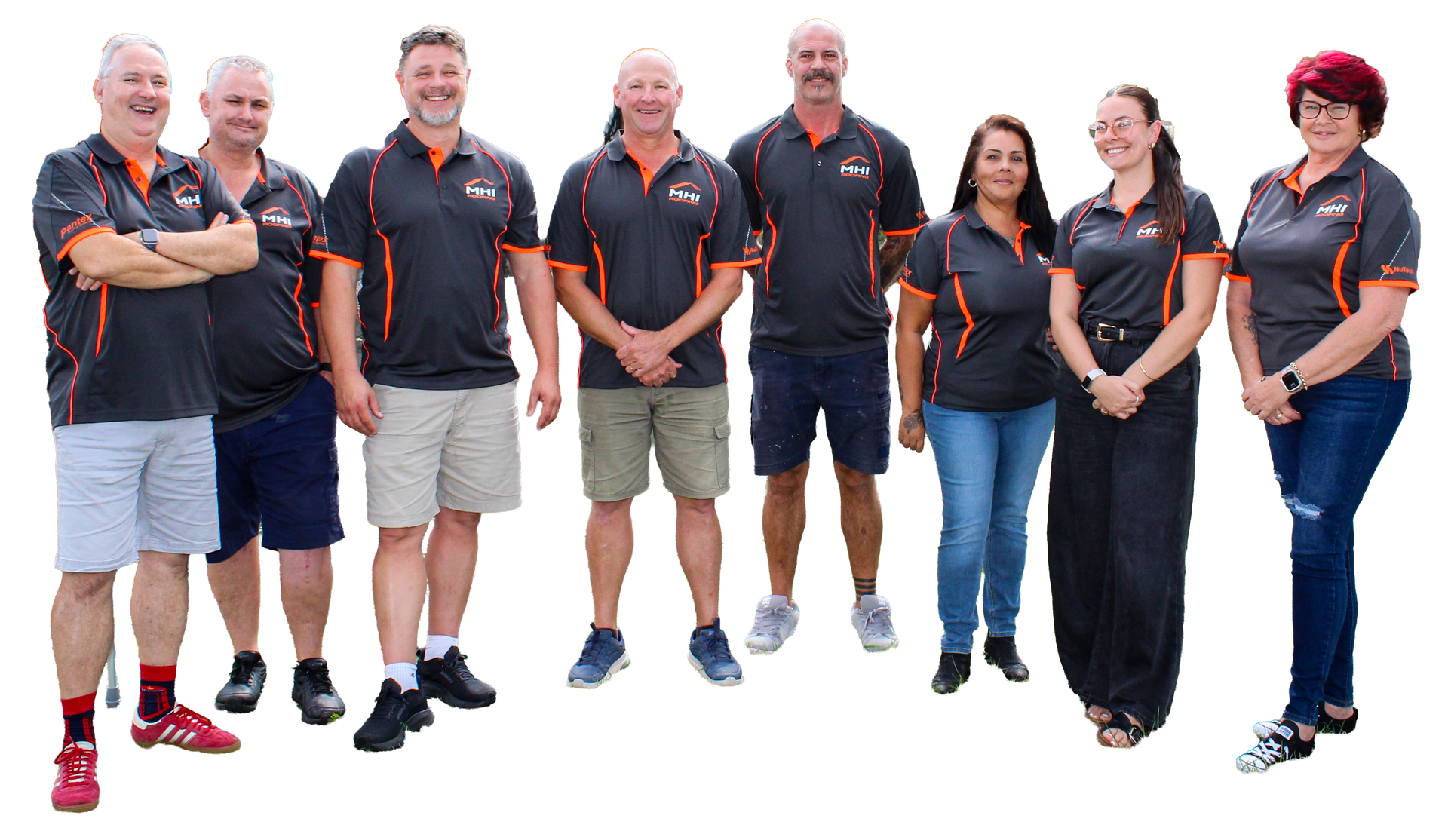 Group of seven people in matching black and orange shirts posing against a white background.
