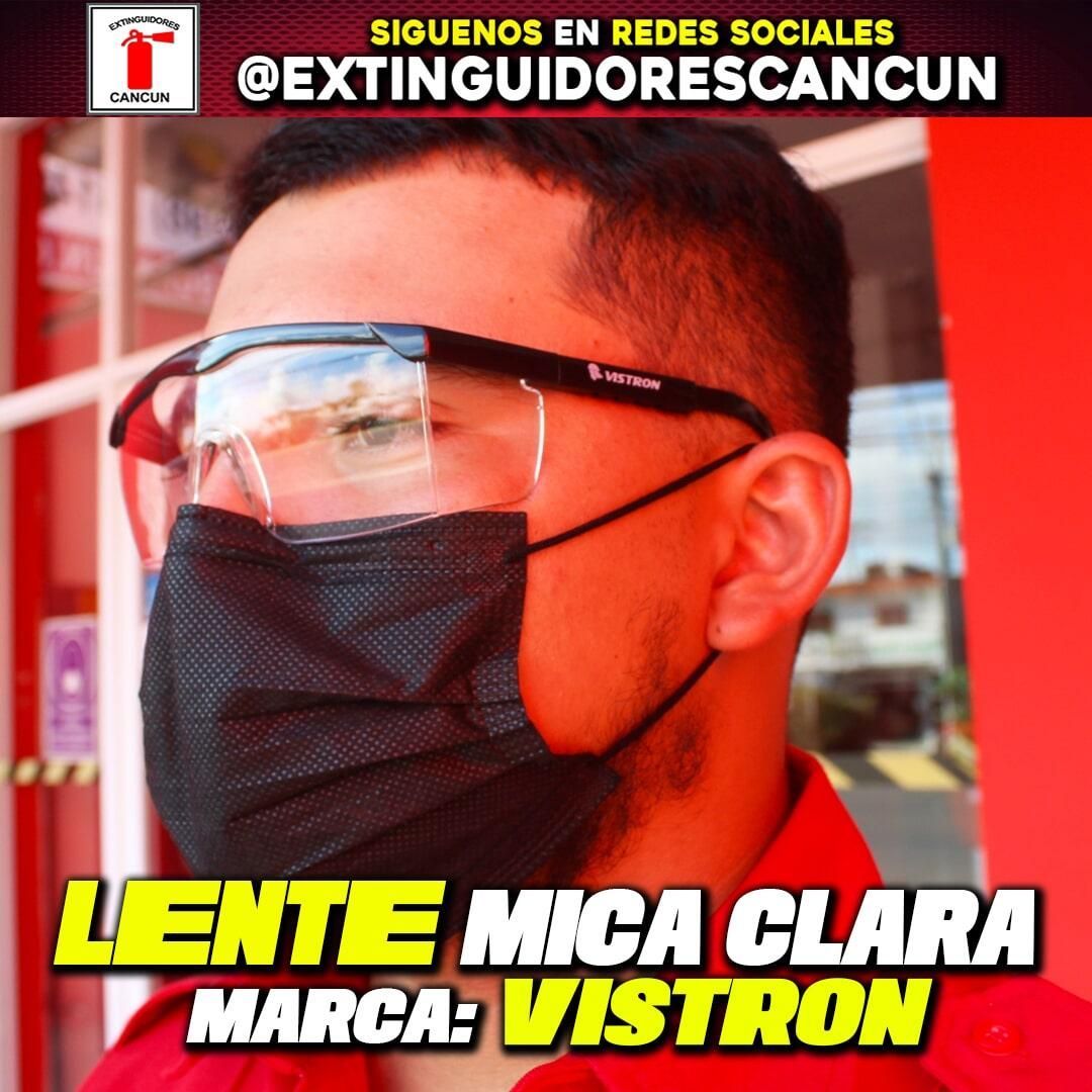 Un hombre con mascarilla y gafas de seguridad dice lente mica clara marca vistron