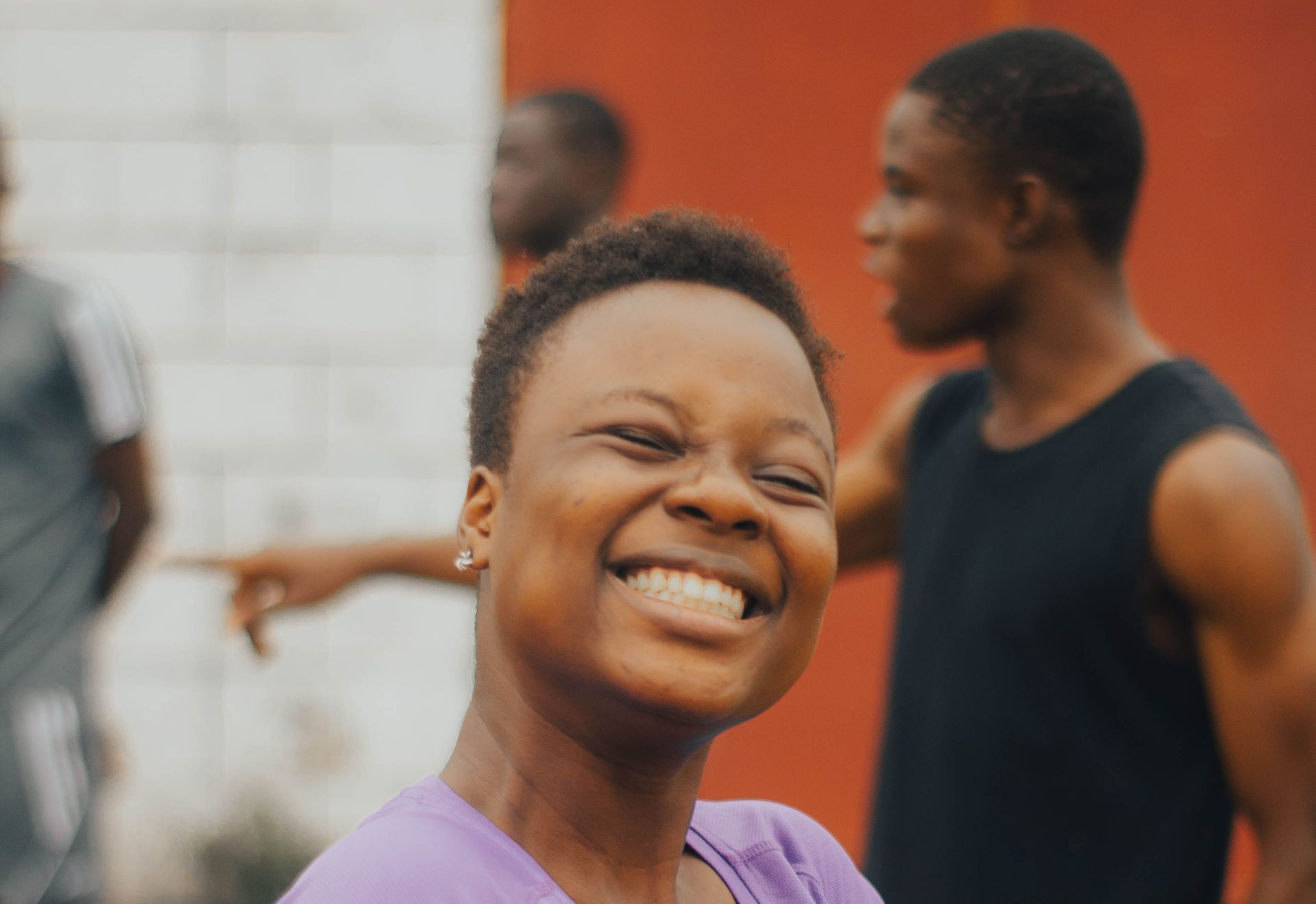 A girl smiling.