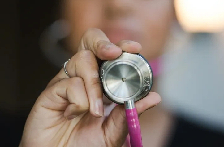 Women looking at post it notes