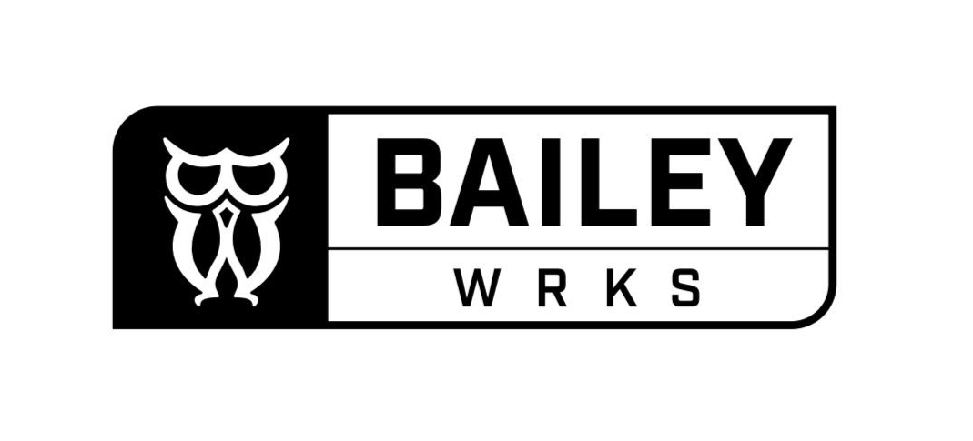 A rectangular black-and-white logo featuring an owl-like icon next to the text 