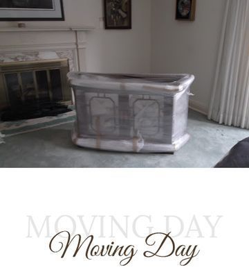 Bar wrapped in plastic, in front of fireplace and window, indicating a move.