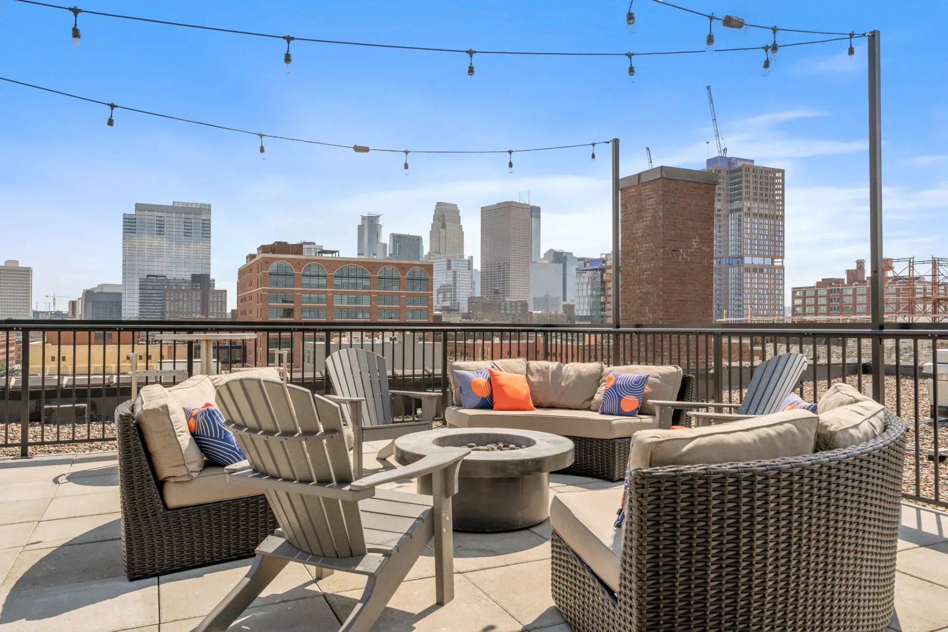 The Copham features a rooftop terrace with a view of Downtown Minneapolis