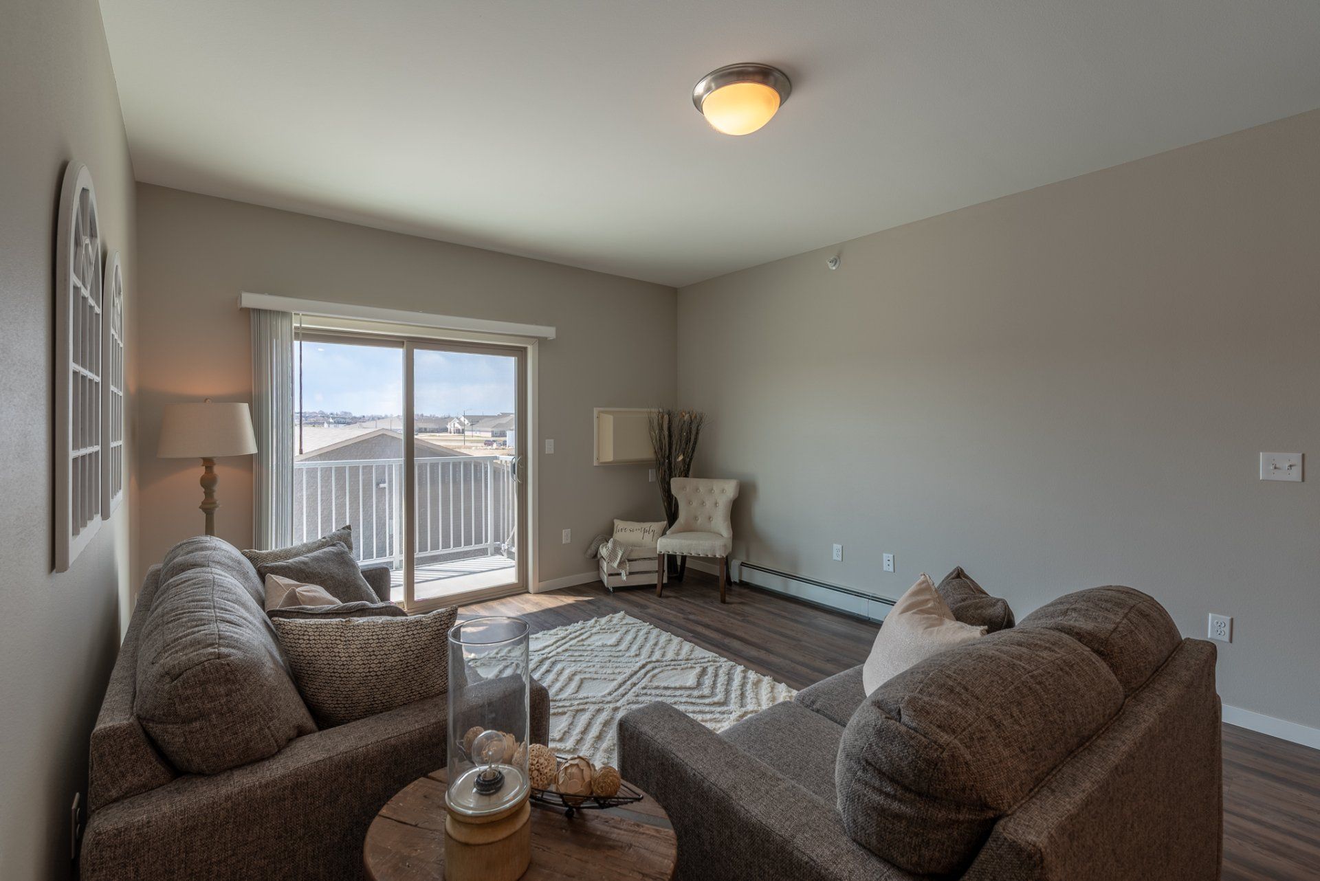 Living room with large sliding door leading to balcony