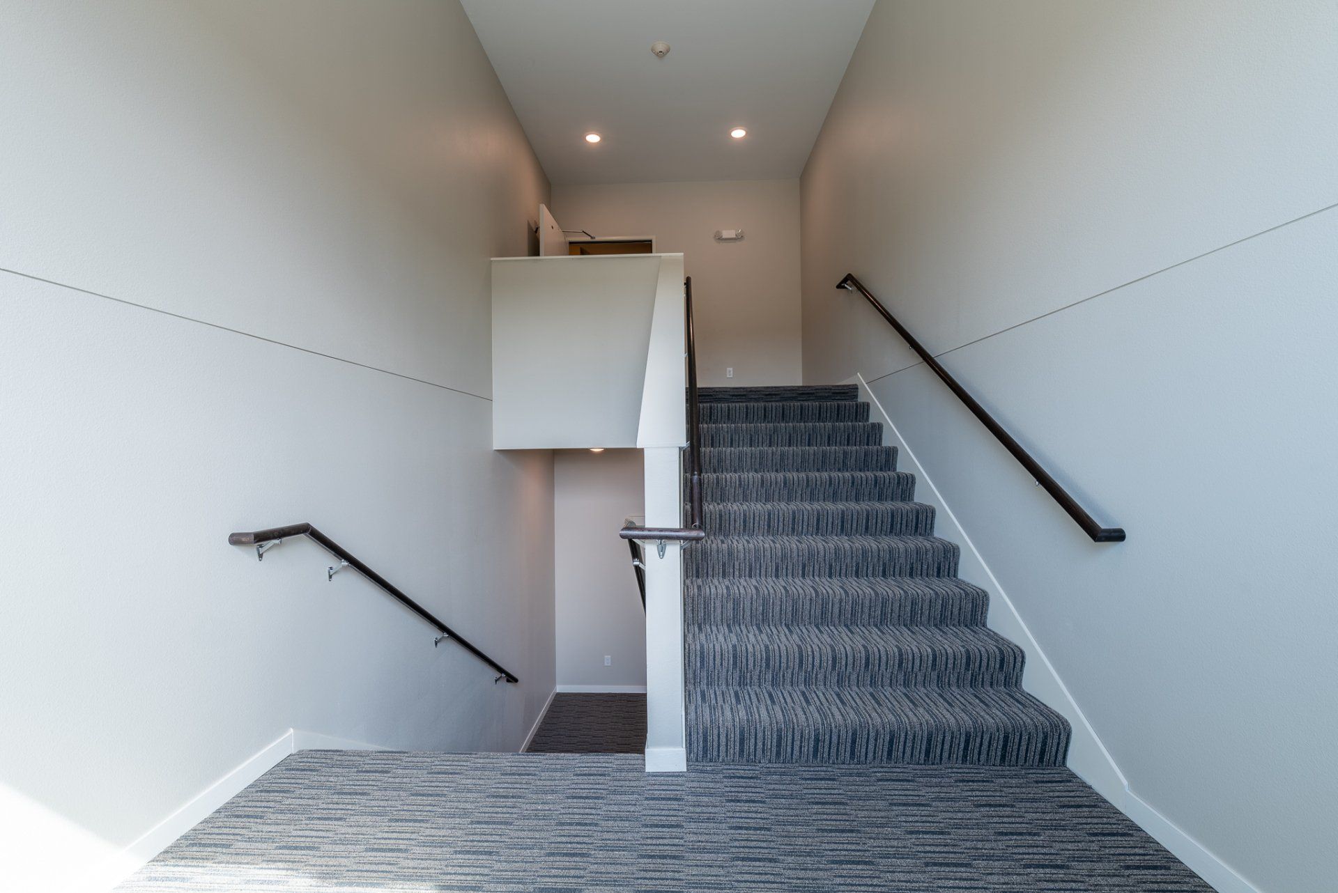 Stairwell leading up and down apartment building