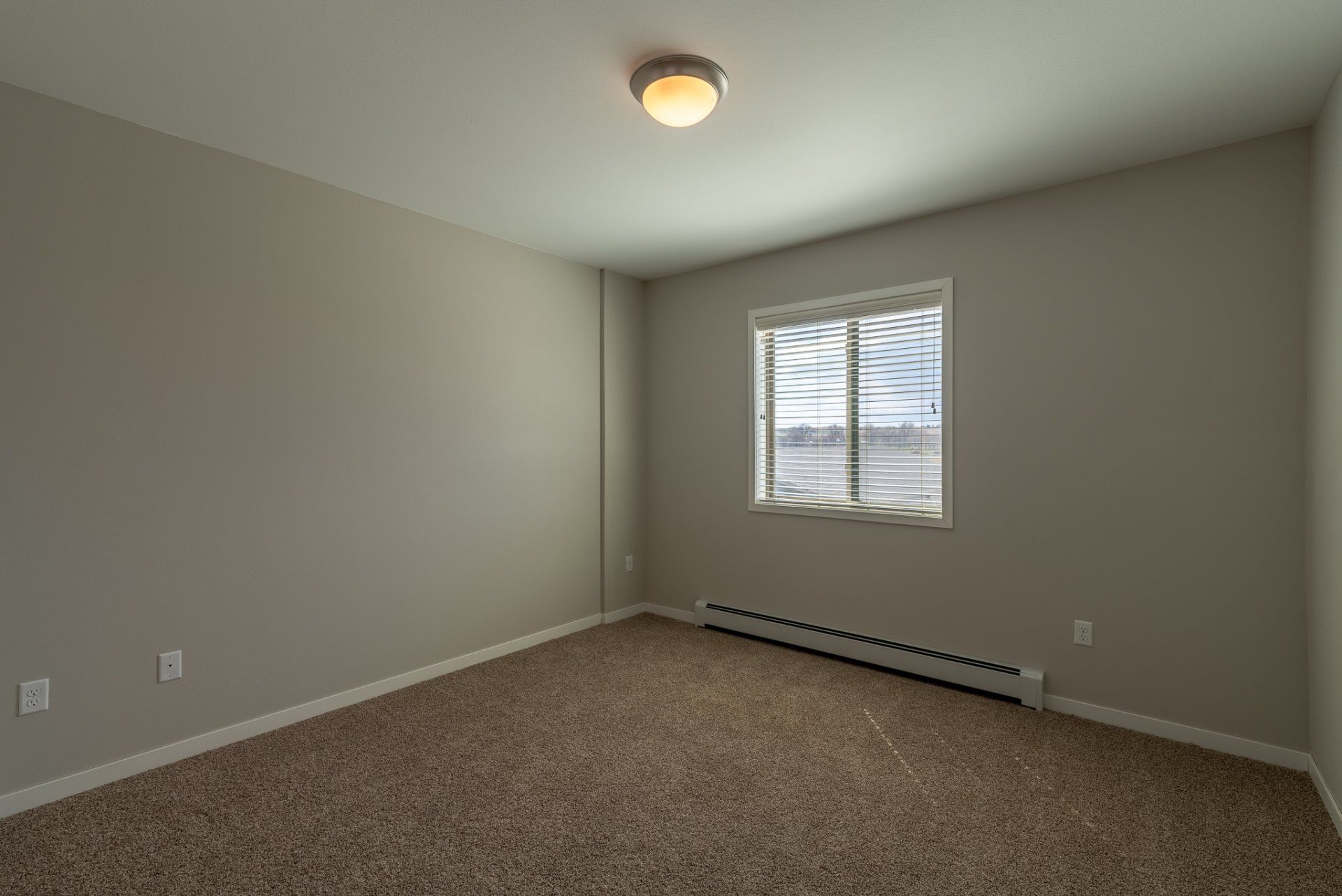 Bedroom with window on wall