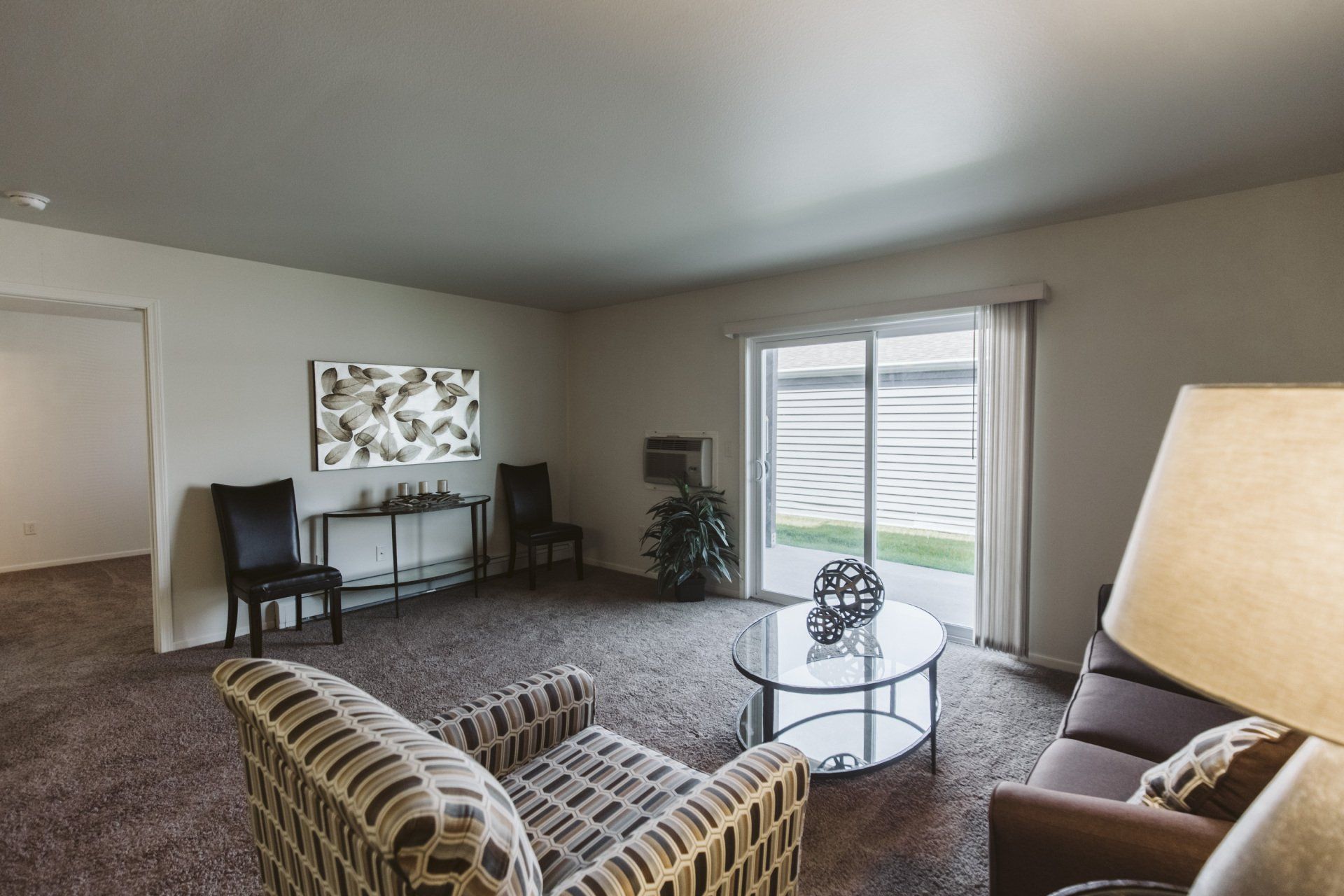 View of hallway from living room leading to bedroom