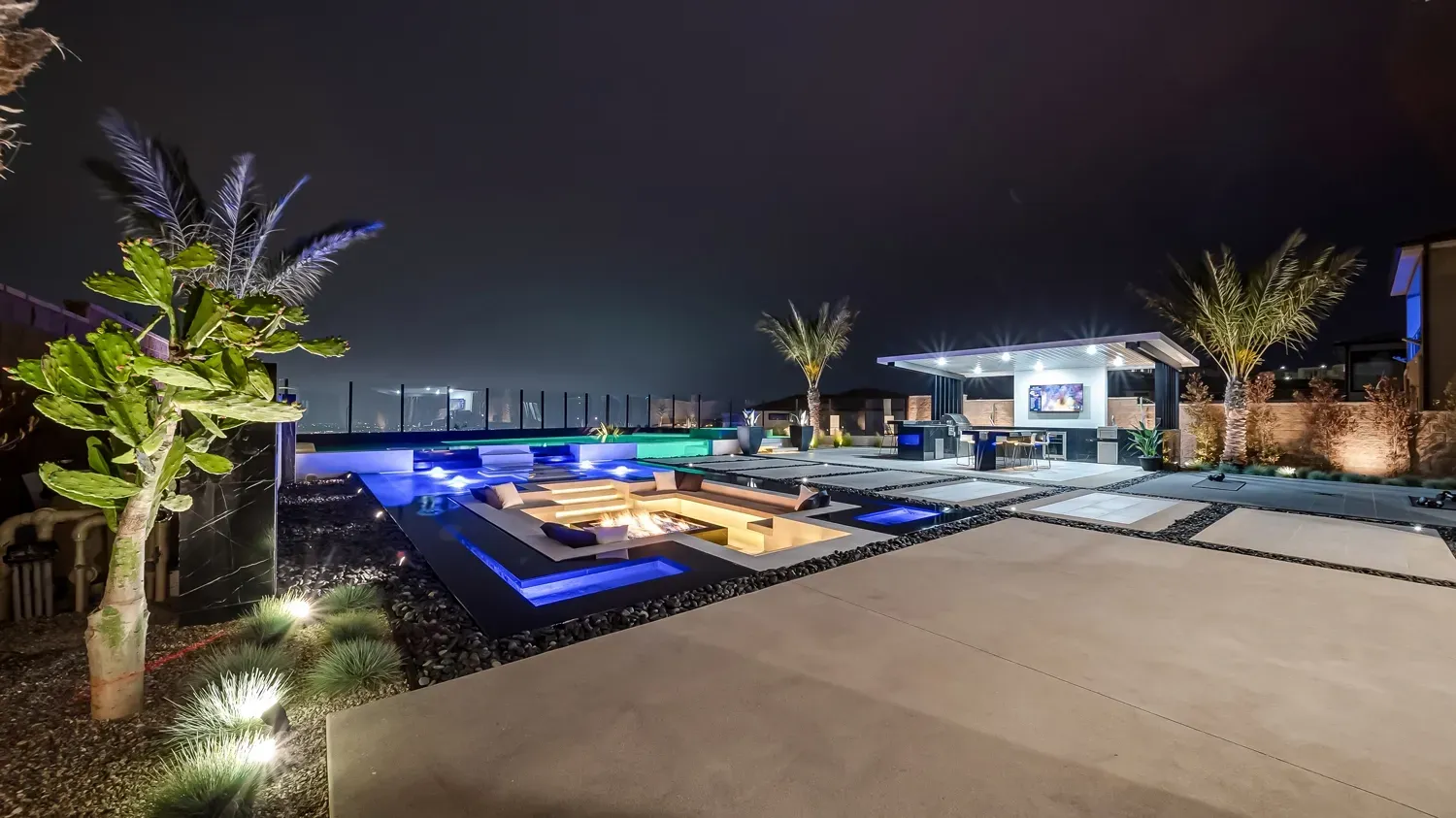 Luxury and custom swimming pool, outdoor kitchen, and landscaping in Porter Ranch Los Angeles. Work done by Westmod.