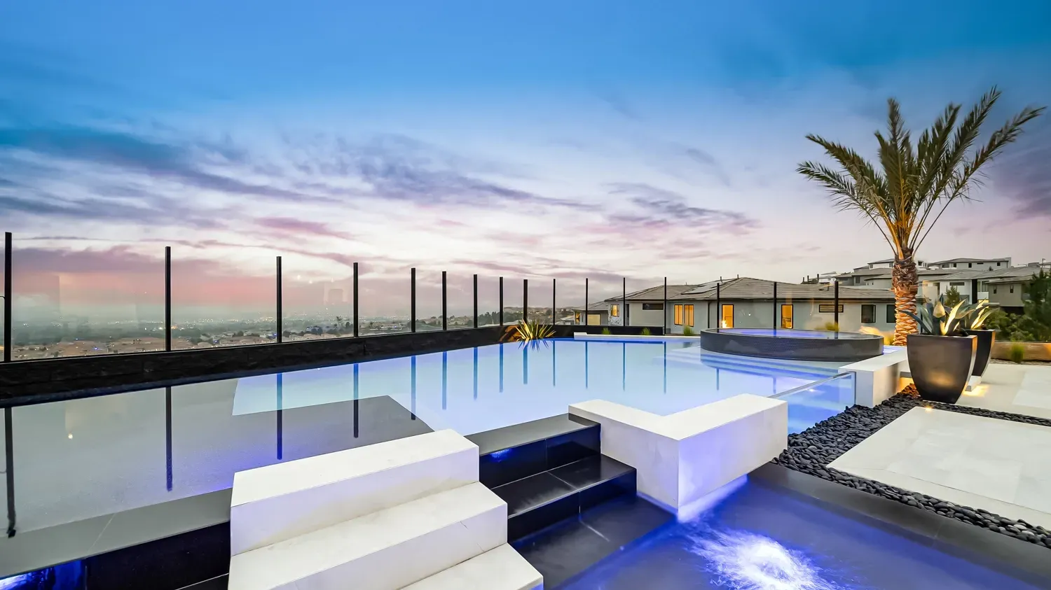 Luxury and custom swimming pool, outdoor kitchen, and landscaping in Porter Ranch Los Angeles. Work done by Westmod.