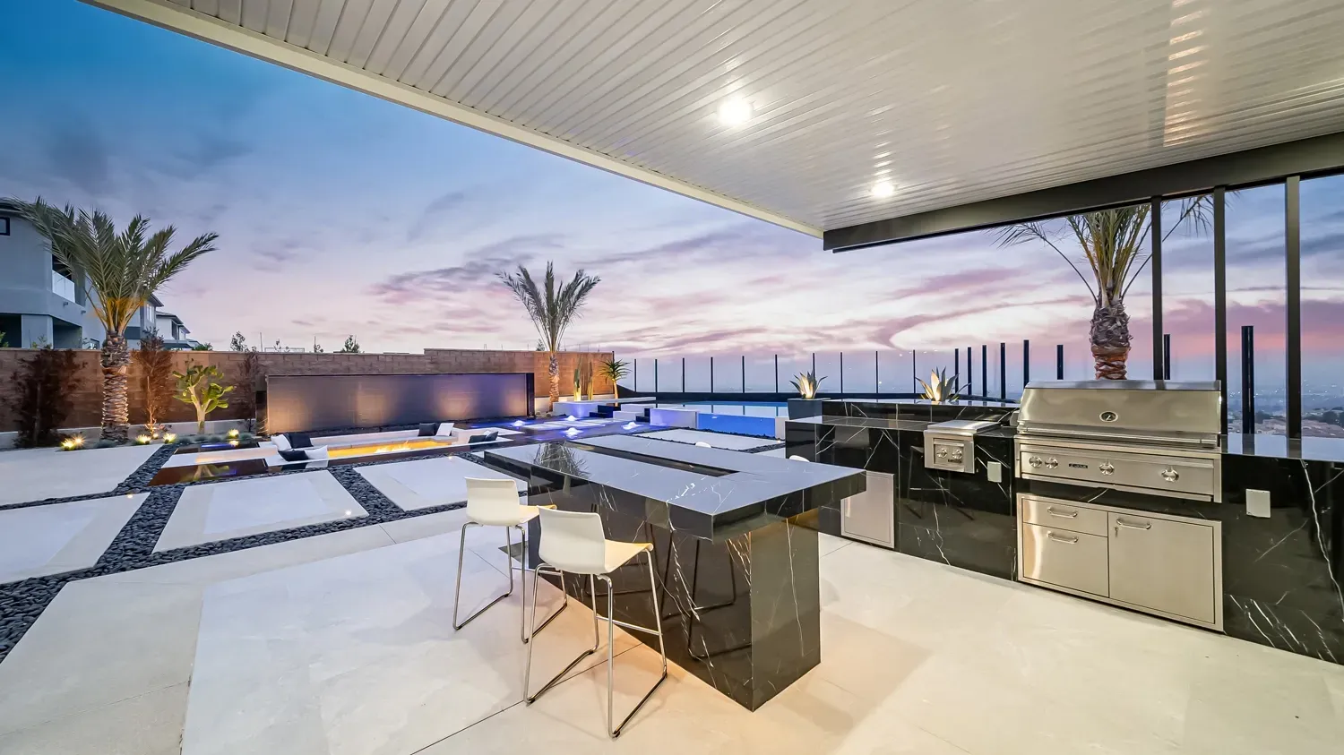 Luxury and custom swimming pool, outdoor kitchen, and landscaping in Porter Ranch Los Angeles. Work done by Westmod.