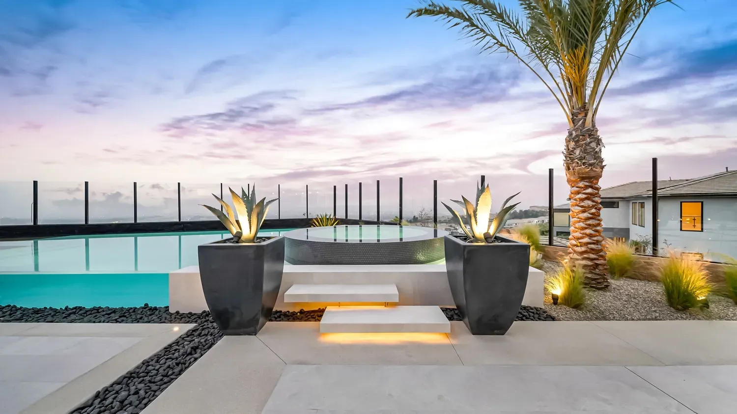 Luxury and custom swimming pool, outdoor kitchen, and landscaping in Porter Ranch Los Angeles. Work done by Westmod.
