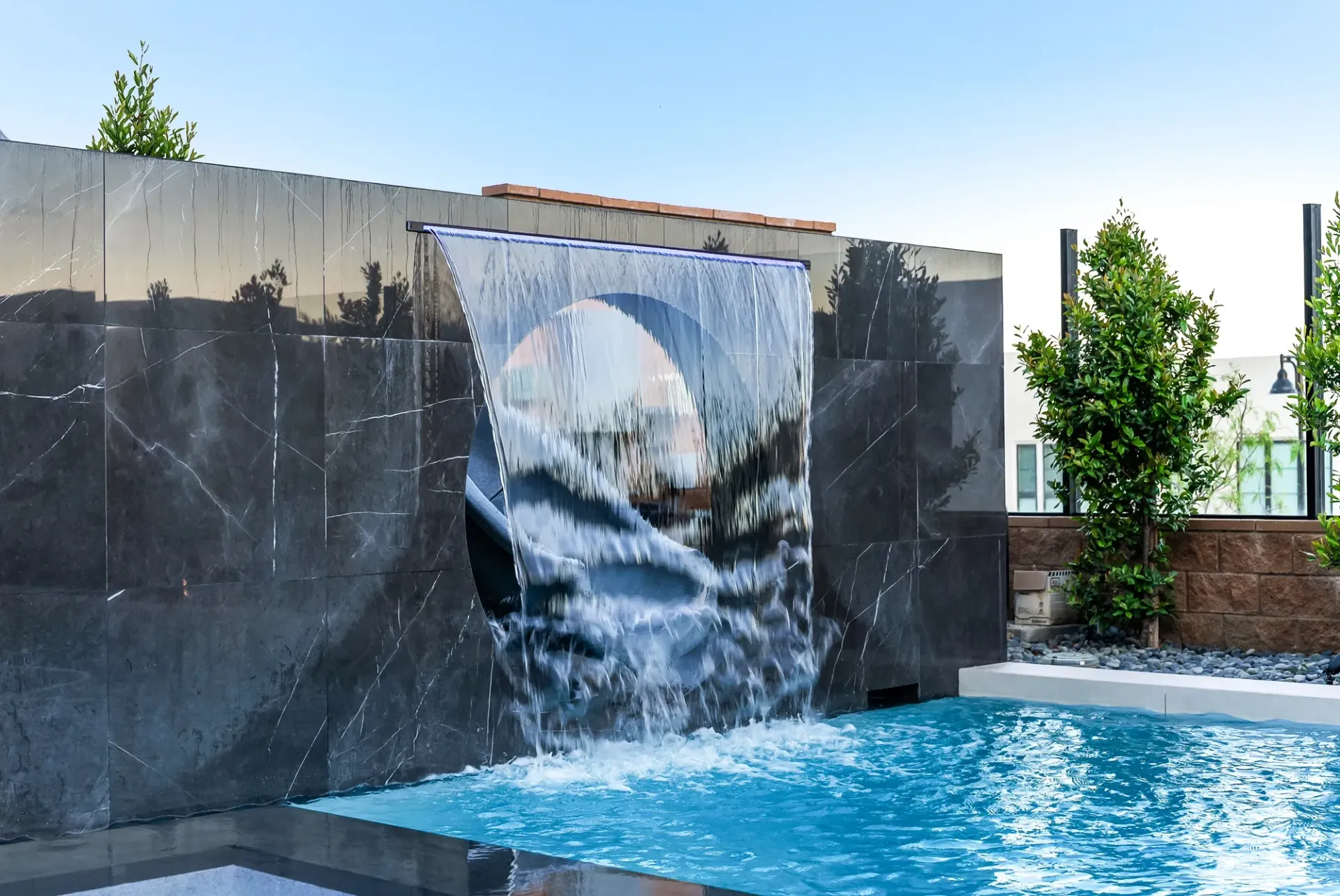 Luxury pool and outdoor living space in Porter Ranch, CA. Design and construction by Westmod.