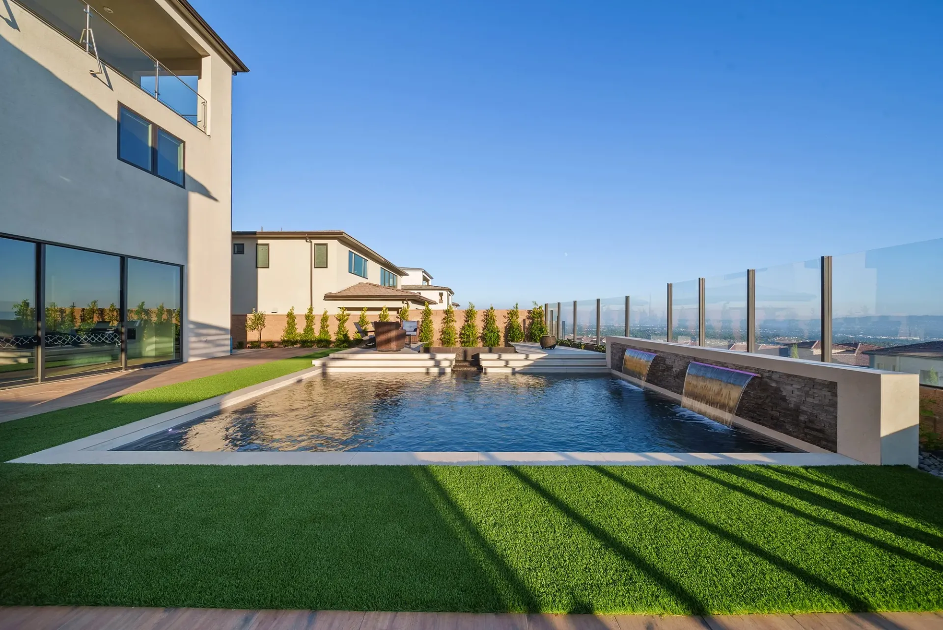 A luxurious yet modest custom pool, spa and outdoor living space in Porter Ranch, CA.