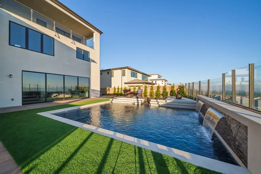 A luxurious yet modest custom pool, spa and outdoor living space in Porter Ranch, CA.