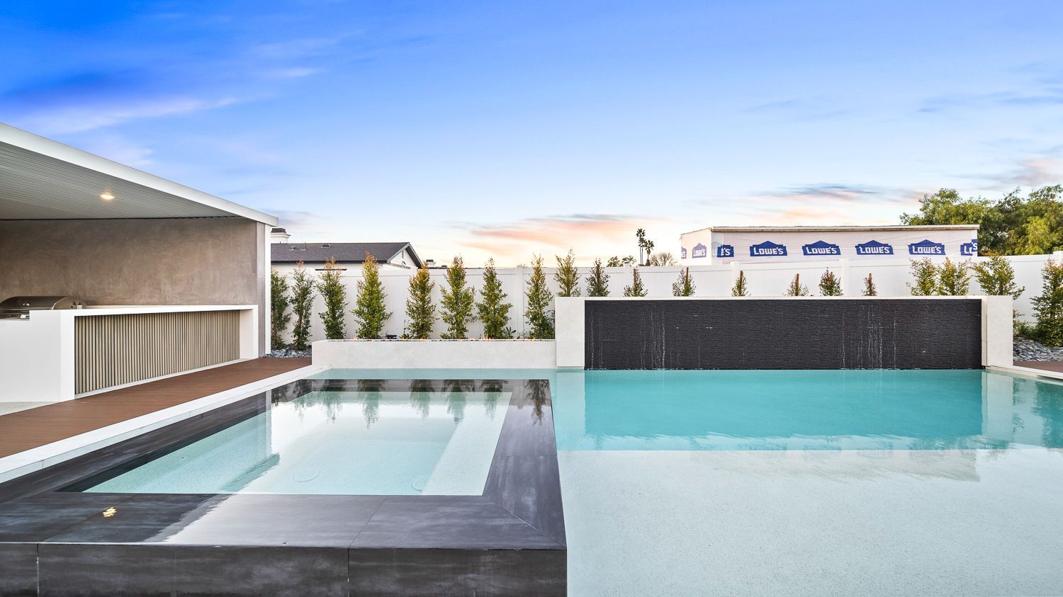 Custom pool and outdoor living project complete with a full court basketball court and outdoor kitchen. Project by Westmod. Location = Santa Clarita, CA.