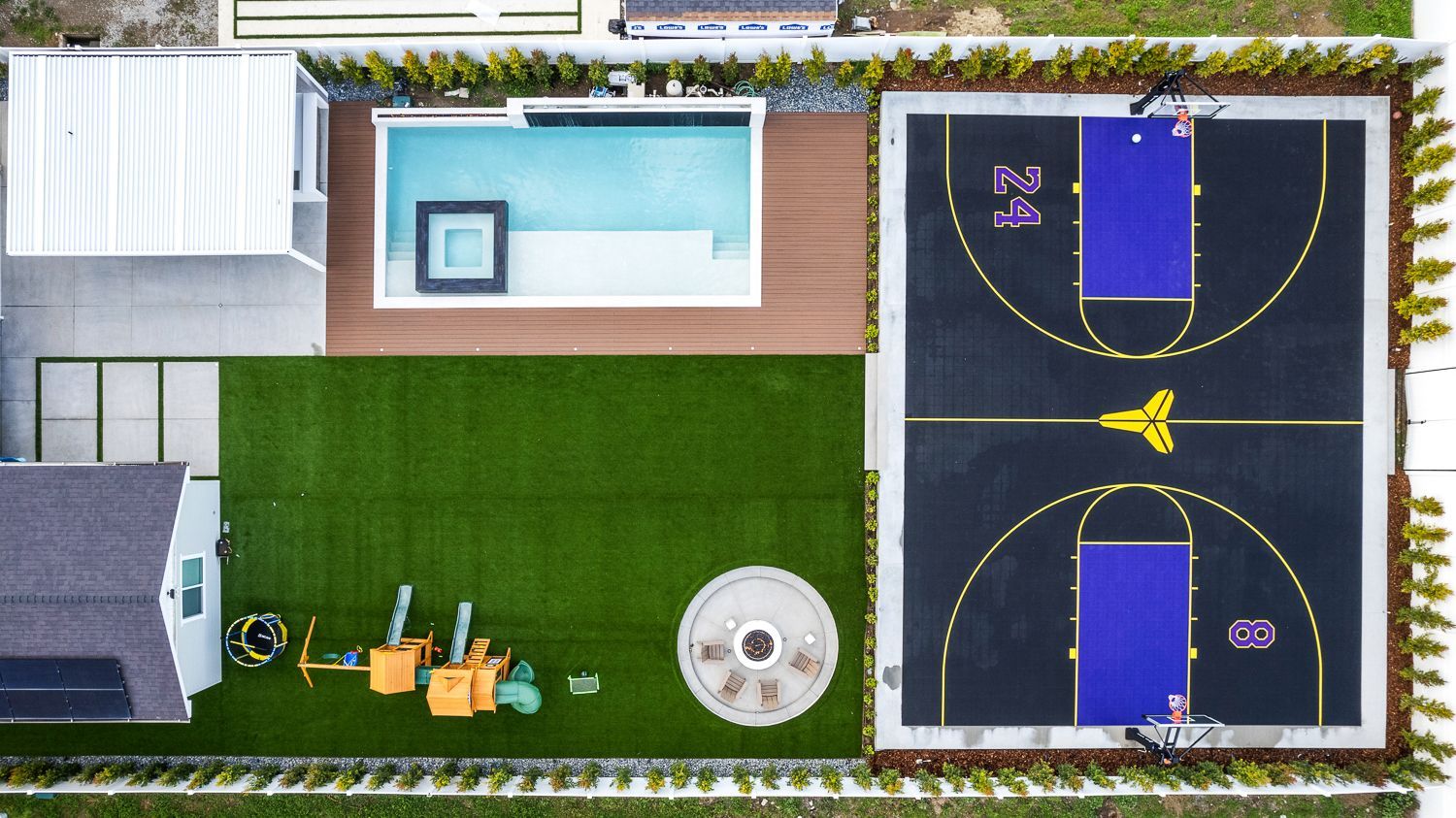 Custom pool and outdoor living project complete with a full court basketball court and outdoor kitchen. Project by Westmod. Location = Santa Clarita, CA.